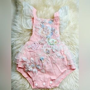 Girls floral romper, size 24 months.